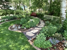 stone walkway with plantings and endging